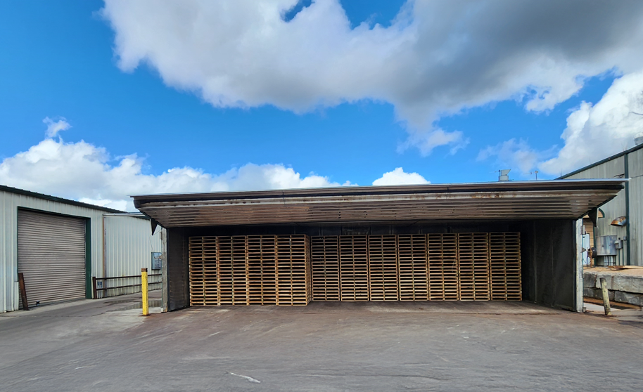 Pallets stacked in the kiln at Pennyrile Pallets