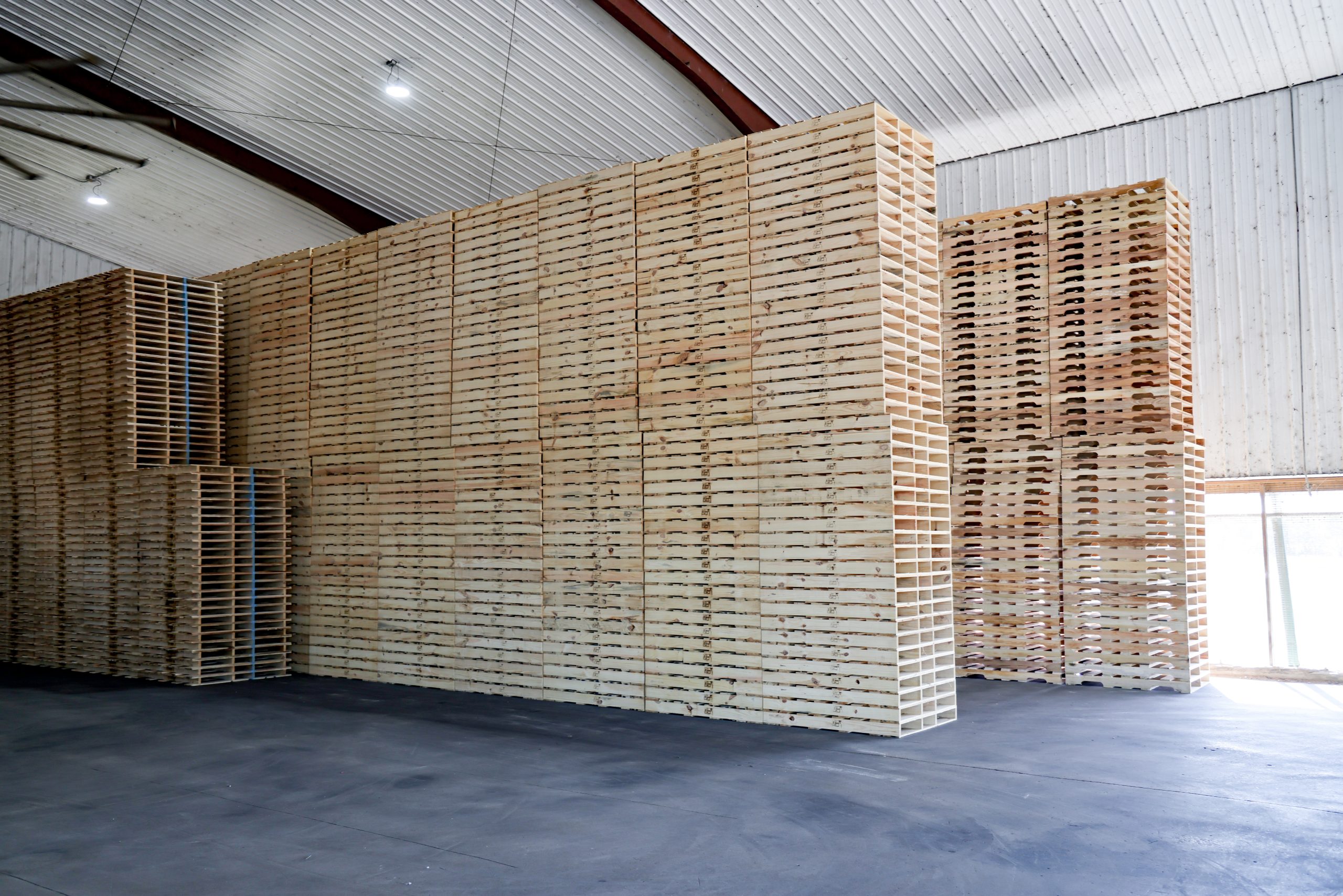 New pallets stored in Pennyrile Pallet's indoor storage facility.